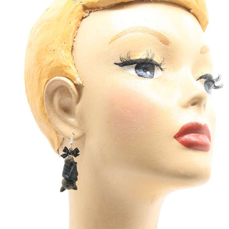 head with bat earrings